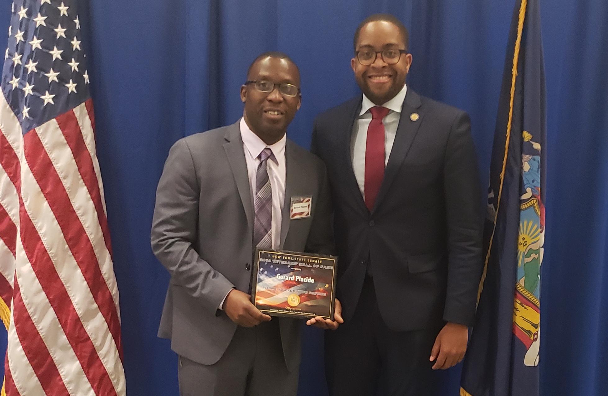 Gerard Placide with Senator Zellnor Myrie at the New York State Senate.