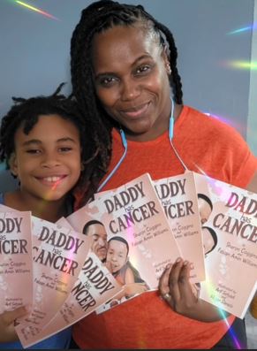 NYSCAS student Sharon Coggins with her son Fabian and the book they wrote together titled, "Daddy Has Cancer."