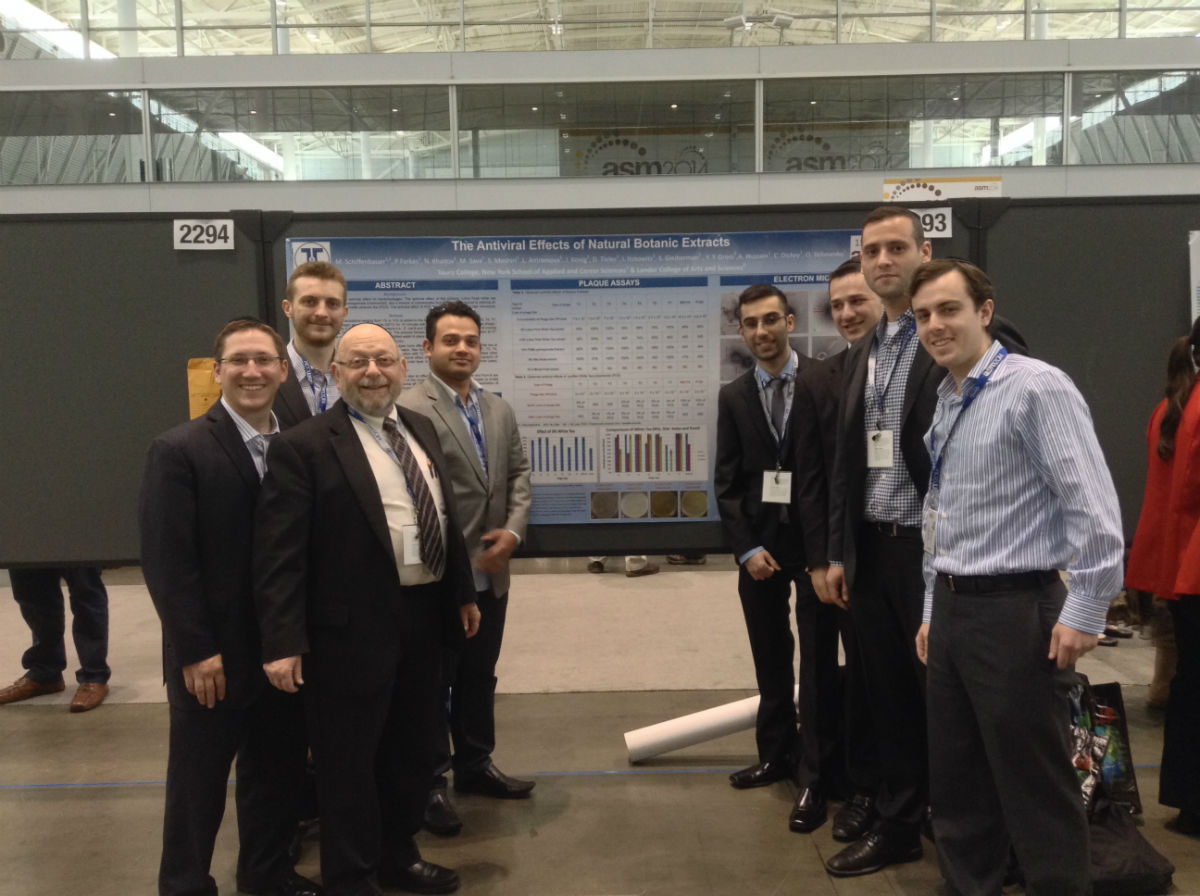 Pinchas Farkas, second from right, with Dr. Milton Schiffenbauer and NYSCAS team that presented research at the American Society for Microbiology annual meeting in Boston.