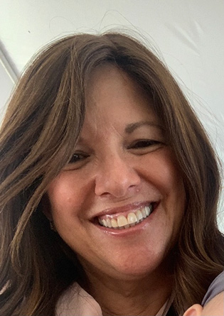 a headshot of professor Lisa Ehrilch