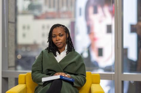 Black female psychologist sitting in an office
