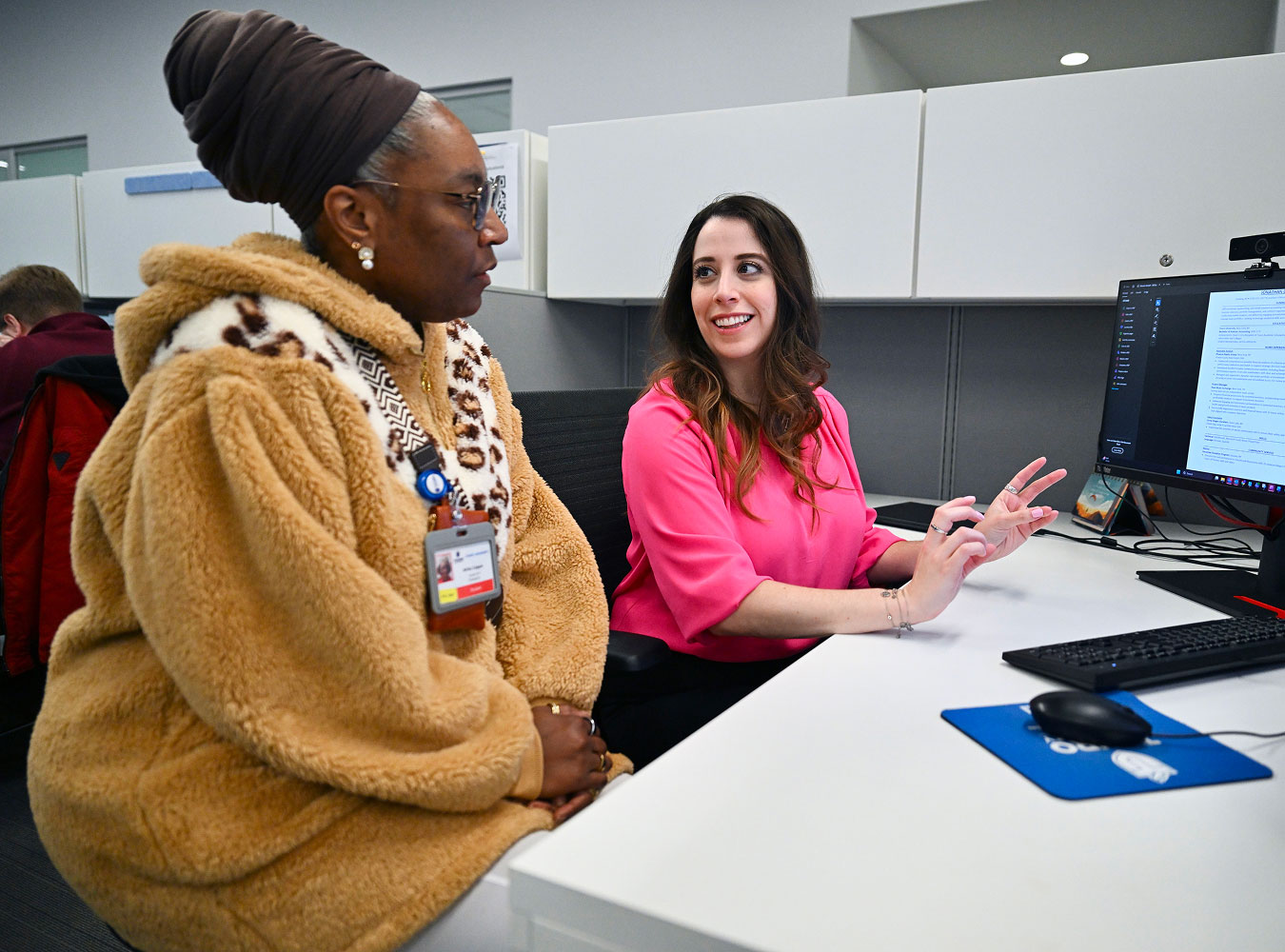 Career services personnel working with student